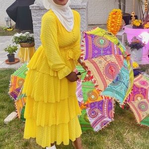 Yellow full length layered and ruffled dress